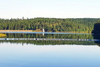 Photo of a dam with water and trees, Building knowledge on water governance