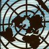 Photo of the UN Logo, Reform of the UN Development System: Analysis and Comments