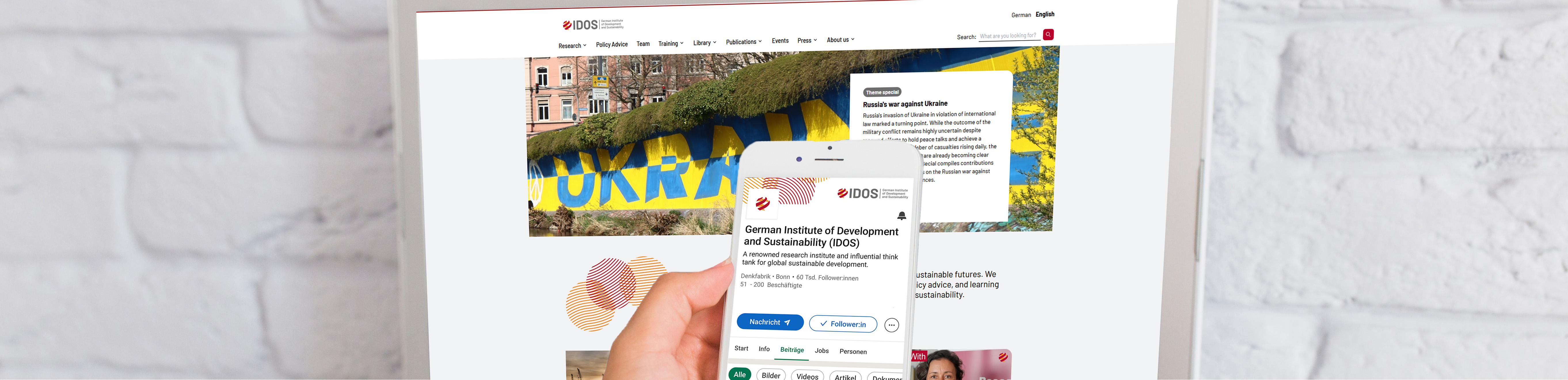 Header: Decoration, smartphone with IDOS website