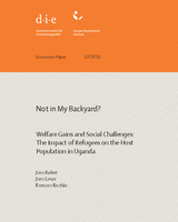 Not in my backyard? Welfare gains and social challenges: the impact of refugees on the host population in Uganda